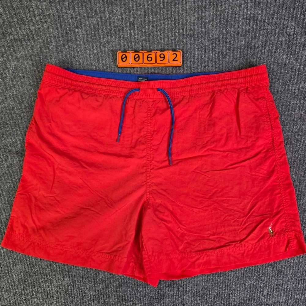 Polo Ralph Lauren orange swim shorts with blue drawstrings. Size XL.